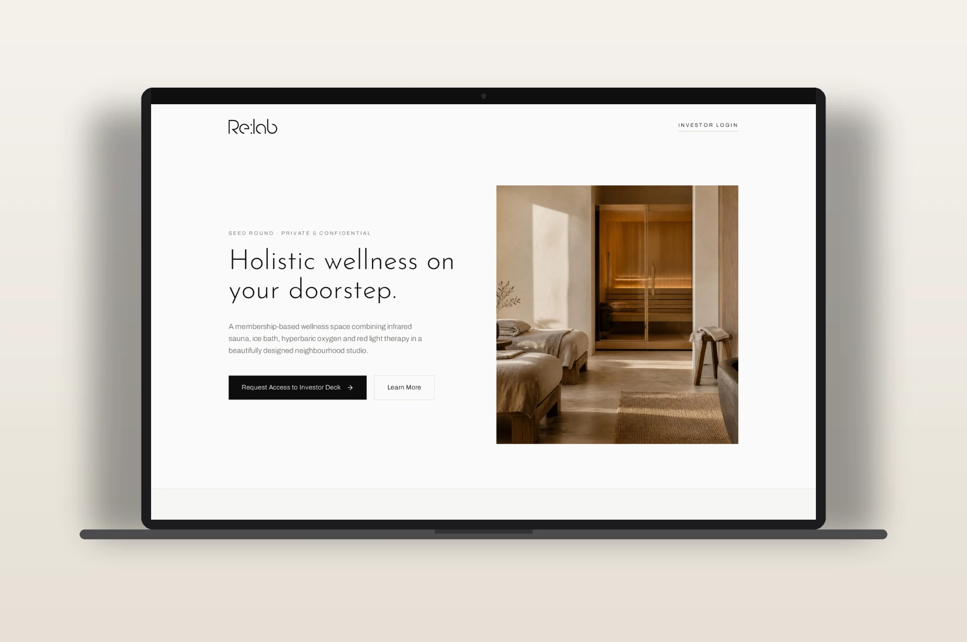 Re:lab investor website shown on a laptop, with a minimal hero and sauna photography