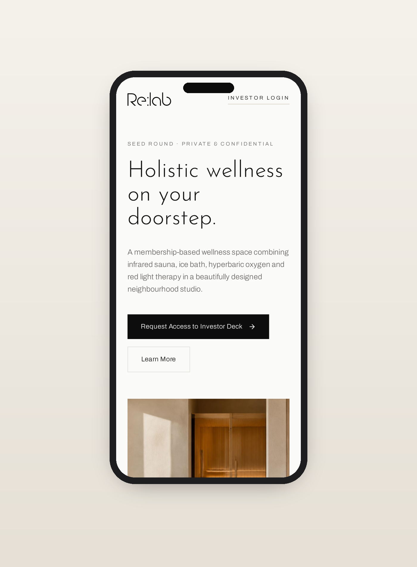 Re:lab investor website shown on a mobile phone, with a minimal hero and sauna photography